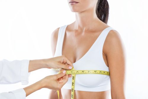 Image of measuring the breast after breast reduction surgery